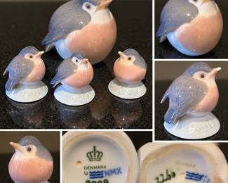 Charming collection of four Royal Copenhagen porcelain bird figurines featuring one larger robin and three smaller coordinating birds. Each is modeled with rounded naturalistic form and hand-painted in soft gray-blue, white and warm rose-pink tones. The three smaller birds rest upon molded pale bases with subtle foliage decoration. Undersides bear Royal Copenhagen Denmark crown and three-wave factory marks, with visible model numbers including 2238 and 2266. An attractive grouping of classic Danish porcelain displaying especially well together. Pre-owned vintage condition with light age-related surface and base wear; please review photographs for individual factory marks and condition.