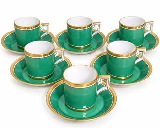 Elegant Richard Ginori Italy porcelain demitasse espresso cup and saucer set featuring a striking emerald green ground accented with broad gold gilt trim, crisp white detailing, and distinctive geometric handles. Each saucer is finished with a coordinating green and gold design and decorative central medallion. Includes six matching demitasse/espresso cups and six saucers, for twelve pieces total. Pieces bear the Richard Ginori Italy backstamp with “Finest in China Since 1735.” The rich jewel-tone color and bold gilt decoration give this set a sophisticated Italian presentation ideal for espresso service, entertaining, display, or a Richard Ginori porcelain collection. Vintage condition with signs of age and use as shown; please review photographs for individual condition, gilt wear, surface marks, and other details. Artist or Maker Richard Ginori