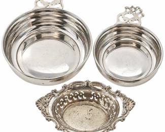 Collection of vintage American sterling silver serving pieces featuring examples by Gorham and Webster. Includes sterling silver handled bowls with decorative pierced openwork handles and an ornate Gorham sterling silver pierced serving, nut or candy dish with elaborate scroll and floral decoration. Visible maker’s marks include Gorham Sterling and Webster Sterling, with additional engraved markings and dates present on select pieces. The collection displays classic American silver craftsmanship with polished surfaces, decorative rims and traditional forms suitable for serving, display or addition to a sterling silver collection. Vintage condition with surface scratches, tarnish, spotting, patina and signs of age and use; please review photographs carefully for condition, markings and measurements. Sold together as one collection.