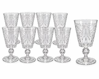 Elegant collection of nine matching clear cut crystal wine goblets featuring deeply cut geometric, fan and teardrop decoration with decorative banding near the rim. Each goblet is raised on a distinctive faceted crystal ball stem and circular foot with radiating cut detail. The substantial cut design catches and reflects light beautifully, making this an attractive set for entertaining, holiday table settings or a crystal stemware collection. Set includes nine wine goblets. Maker and pattern have not been confirmed. Pre-owned condition with light wear consistent with age and use; please review photographs for condition and details.
