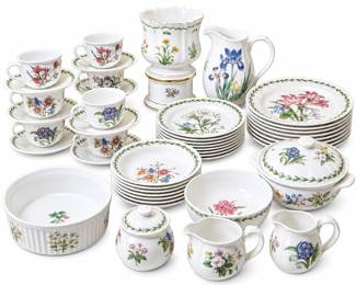 Charming vintage botanical floral dinnerware and serving collection featuring an assortment of colorful flower motifs on white grounds with coordinating green leafy borders. Collection includes approximately seven soup bowls, eight salad plates, twelve floral drinking glasses, eight teacups with coordinating saucers, and assorted serving pieces including pitchers/creamers, covered serving pieces, sugar bowl, serving bowl and other coordinating pieces as photographed. Floral designs vary throughout the collection, creating an attractive mix-and-match botanical table setting with wonderful cottage, garden and traditional appeal. Approximately thirty-five pieces are specifically noted in the place-setting count, plus various serving pieces. Vintage pre-owned condition with expected signs of age and use; please review all photographs carefully for exact piece count, patterns, condition and included items.