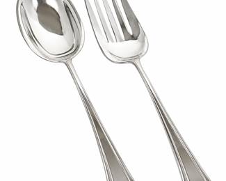 Vintage R.D. sterling silver serving utensil set featuring a large serving spoon and coordinating four-tine serving fork. Both pieces display an elegant streamlined handle with stepped geometric detailing characteristic of the Art Deco period. Each is clearly hallmarked “RD STERLING PAT. 1929.” The set retains its original vintage surface with visible scratches, patina, tarnish and wear consistent with age and use. An attractive early twentieth-century sterling silver serving pair for use, collection, or addition to a vintage flatware service. Please review photographs carefully for marks, condition and details.