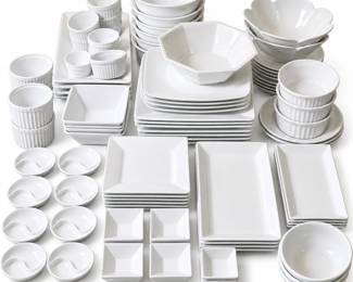 Extensive collection of contemporary white porcelain dinnerware and serveware featuring a versatile assortment of shapes and sizes suitable for everyday dining, entertaining, catering or restaurant-style presentation. Collection includes square and rectangular plates and platters, round bowls, scalloped serving bowls, an octagonal serving bowl, ribbed ramekins in multiple sizes, square condiment and dipping bowls, divided appetizer dishes and additional coordinating serving pieces. The crisp all-white palette allows the various geometric and traditional forms to mix easily while providing a clean presentation for a wide variety of table settings. A substantial collection with numerous place-setting, serving and specialty pieces. Items are pre-owned and may exhibit light surface wear, utensil marks or other signs of normal use. Please review photographs carefully for exact assortment, quantities, sizes and condition.