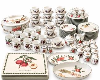 Extensive Royal Worcester Evesham Gold porcelain dinnerware and serving collection featuring the classic English fruit and botanical pattern with gold-trimmed rims. The collection includes a large assortment of dinner plates, luncheon/salad plates, cups and saucers, mugs, covered individual serving pieces, pitchers, covered sugar bowl, serving dishes, platters and additional coordinating pieces as shown. Individual pieces display assorted hand-colored-style fruit and botanical motifs including apples, pears, plums, berries, grapes and other produce on a warm ivory ground. A substantial and highly decorative collection suitable for entertaining, display, or adding to an existing Royal Worcester Evesham service. Please review all photographs for the exact assortment, quantities and condition of individual pieces. Collection is being offered together as shown; minor wear to gilt decoration and other signs of previous use may be present.