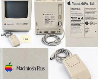 Vintage Apple Macintosh Plus 1Mb compact personal computer, Model M0001A, featuring the iconic all-in-one beige case, built-in CRT display, 3.5-inch floppy disk drive and classic rainbow Apple logo. Rear manufacturer label is copyright dated 1987 and identifies the unit as Made in U.S.A. Includes original-style Apple single-button wired mouse and attached power cord as shown. A highly recognizable piece of early Apple computing history with strong appeal to vintage computer, technology and Apple collectors. Computer has not been represented as tested unless otherwise noted; functionality is not guaranteed. Pre-owned vintage condition with age-related discoloration, surface wear and handling marks. Please review photographs for included components, ports, labels and overall condition.