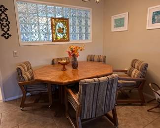 Dining Room Table with Caster Chairs