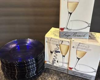 Champagne Glasses And Blue Glass Plates