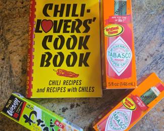 Title: Chili Lover’s Collection – Vintage Cookbook, Tabasco Pepper Sauce & Wasabi Description: Fun spicy-food kitchen grouping featuring the fifth edition Chili-Lovers’ Cook Book: Chili Recipes and Recipes with Chiles, boxed Tabasco Original Red Pepper Sauce, boxed Tabasco Brand Pepper Sauce, and S&B prepared wasabi in tube packaging. Great for chili enthusiasts, hot sauce collectors, cooks, grilling fans, or as a novelty kitchen grouping. Please review photo for exact contents, packaging, condition, and expiration information where applicable.
