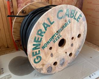 Lot #49 - General Cable Black Electrical Cable on Wooden Spool