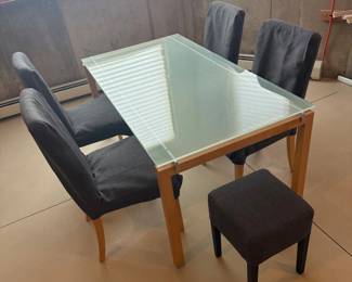Lot #131 - Glass-Top Dining Table with 4 Gray Chairs & Ottoman