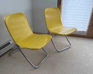 Lot #145 - Pair of Yellow Molded Shell Chairs with Chrome Sled Bases