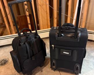 Lot #142 - Pair of Black Rolling Carry-On Suitcases including California Pak