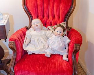 Victorian-style red-velvet Gentlemen’s Chair, Porcelain Dolls, antique doll cradle