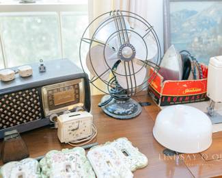 Vintage Silvertone AM/FM Stereo, Porcelain Light Switch Covers, Vintage Sunbeam Iron, Vintage Westinghouse Fan, Cowbells, Singer Sewing Machine