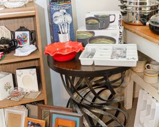 Side table, Picture frames, bookshelf, table, dinnerware, kitchen utensils, decorative plates