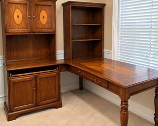 Three-piece traditional wood executive office set with desk, bookcase and storage hutch – $450 for complete set.