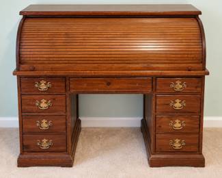 Traditional wood roll-top desk – $250. Very good overall condition with minor hardware/adjustment needed.