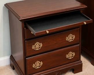Cherry wood nightstand. Part of complete matching bedroom set. Complete set $1,200.