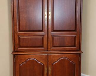 Cherry wood entertainment armoire – $250 – good condition, one door needs minor hinge adjustment.