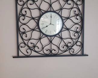 Decorative wrought iron wall clock – $65
