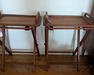 We do have a total of Two teak butler tables