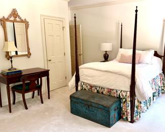 Antique Sea Captains trunk, La Barge Mirror, custom bedding, silver candlestick lamp