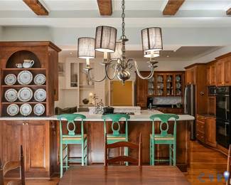 Italian pottery, designer barstools in a wonderful soft green