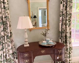 Kidney Shaped Desk, La Barge Mirror, MCM lamp, and draperies to die for!