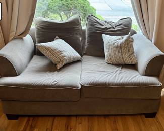 08 Raymour and Flanigan olive green loveseat