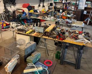 tools, Grumman canoe, camping gear, wheel chair, victrola cabinet, enhanced vision reader