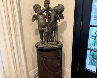 On wood cabinet base.