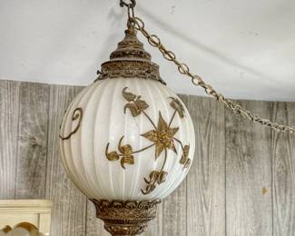 Vintage mid-century modern hanging globe swag lamp (Turned off).