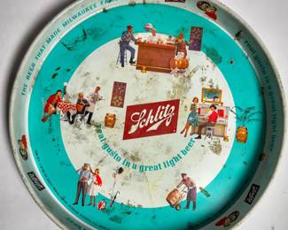 Vintage 1962 Schlitz metal beer tray featuring a turquoise and white design with the slogan "Real gusto in a great light beer" and various illustrated party scenes.