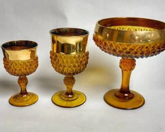  Vintage amber glass pieces from the Indiana Glass Company in the "Diamond Point" (or "Golden Elegance") pattern with gold-gilt rims, produced around 1970.