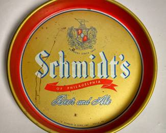 Vintage 13-inch round metal serving tray from C. Schmidt & Sons in Philadelphia, Pennsylvania commonly produced around the 1950s to 1970s.