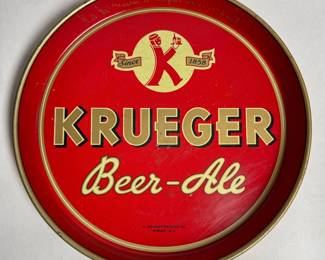Vintage 1940s G. Krueger Brewing Co. 12-inch metal beer serving tray from Newark, New Jersey.