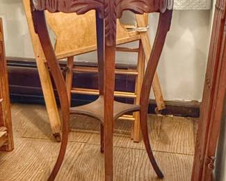 Vintage wooden pedestal with carved cabriole legs and an inset top, resembling 19th-century or early 20th-century French Provincial or Louis XV style plant stands and gueridon tables.