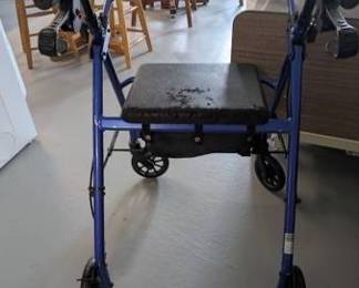 Blue Four-Wheeled Rollator Walker