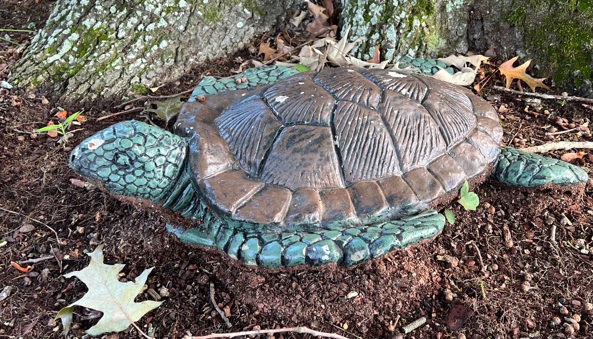 Decorative green garden turtle photographed at a Chesapeake estate sale