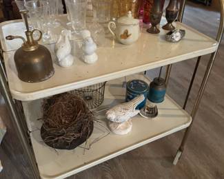 assortment of glasses and vintage items.