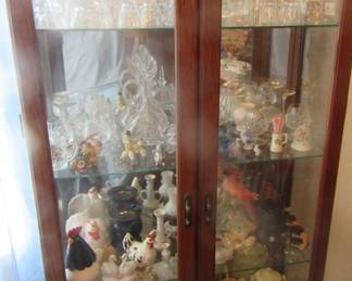  cabinet full of collectibles