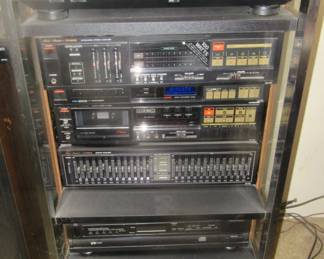 Fisher component tower with 2 Fisher speakers, selling as one unit only. 
