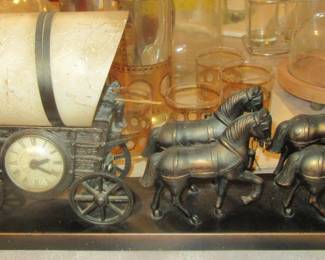 Vintage metal horse drawn wagon (working) clock and light.