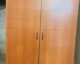 two-door wooden wardrobe or armoire