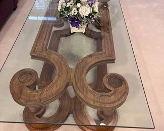 Scroll wood base with glass top coffee table