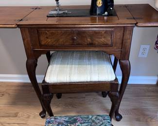 Singer, sewing machine in cabinet