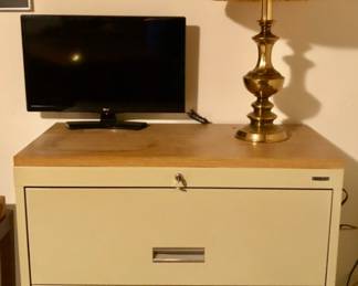 2 Drawer Metal Tan File Cabinet is 36 inches wide X 18 inches deep X 29.5 inches tall $25