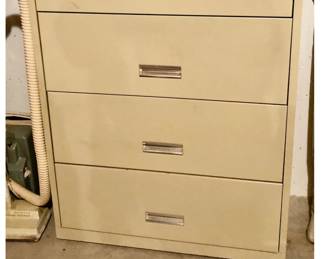 Large 4 Drawer Metal Tan File Cabinet in the back is 36 inches wide X 18 inches deep X 52 inches tall $35