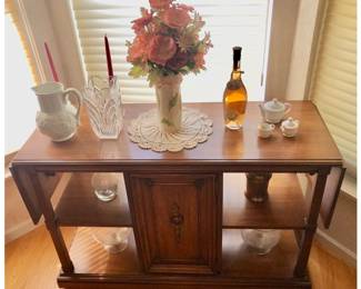 Very Cool Burlington House Furniture Drop Leaf Sideboard / Buffet / Liquor Table is 30 inches tall X 69.5 inches long including both leaves (46 inches long without the leaves up) X 18 inches deep.$200