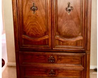 Huntley by Thomasville Armoire / Gentlemen’s Wardrobe / Tall Chest of Drawers is 59.5 inches tall X 40 inches wide X 19 inches deep $185